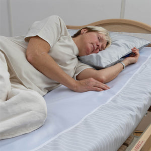 Handicare WendyLett Sliding Sheets user in bed – Manual Transfer Aids | VIVA Mobility